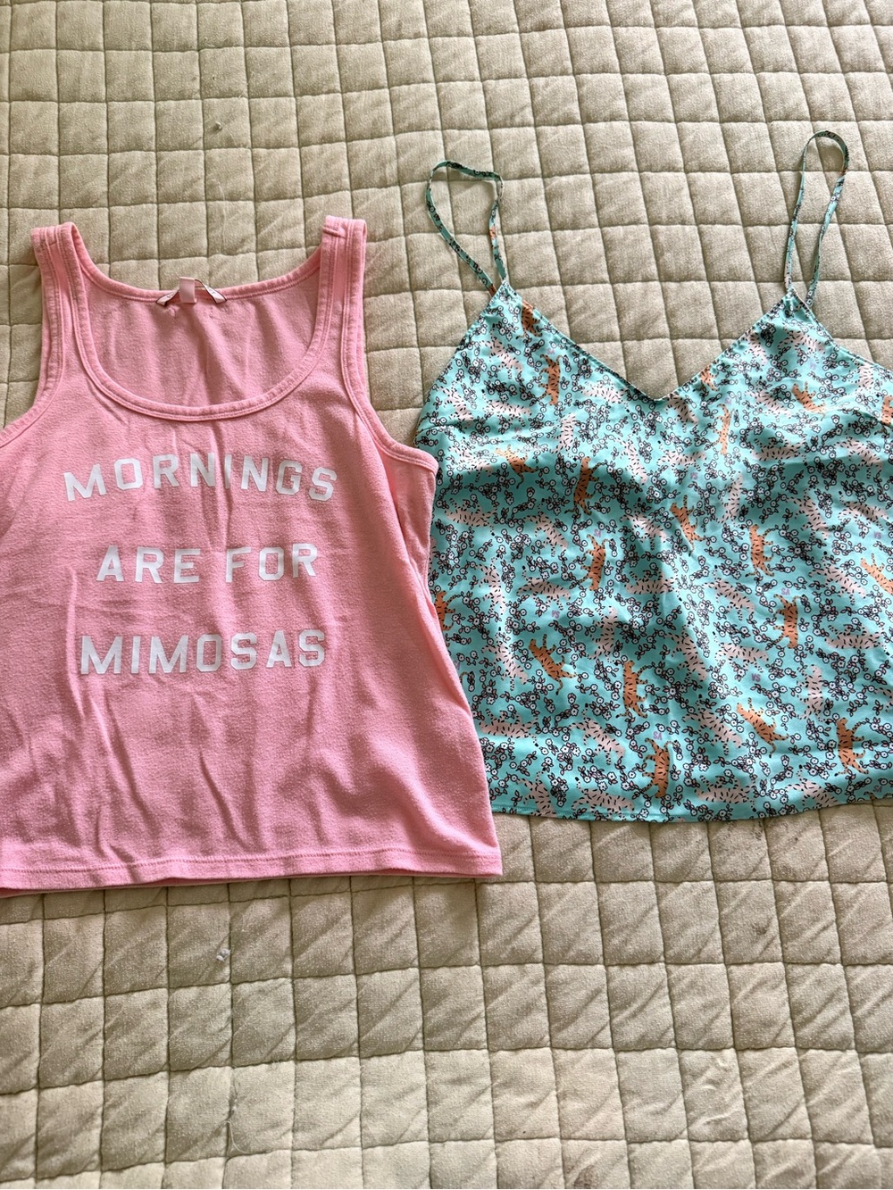 2 Victoria’s Secret tank tops